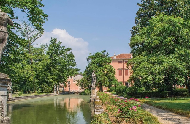 Walk in a beautiful park, along a tree-lined avenue and through an Italian garden and past a long st