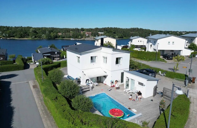 Water facing family friendly villa with pool & sauna overlooking the Baltic Sea