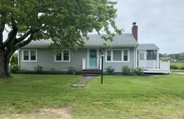 Waterfront! Beautiful river views! Kayaks, paddleboard, porch, fire pit!