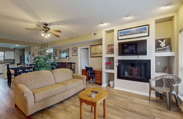 Waterfront community condo with on-site pool, water views, & private patio