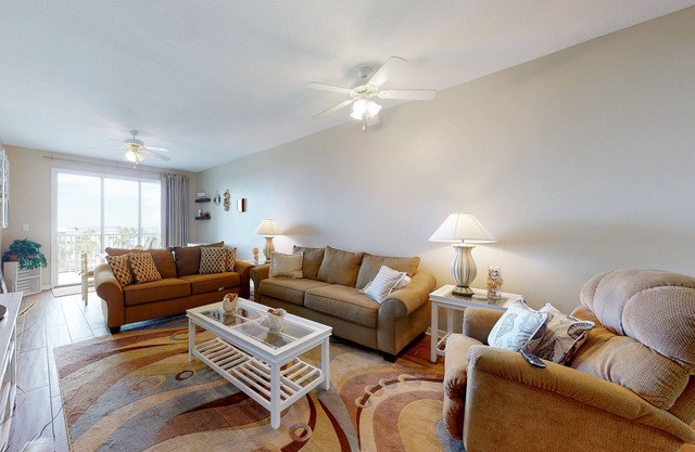 Waterfront condo with bay views, pool, hot tub, boat ramp, & private balcony