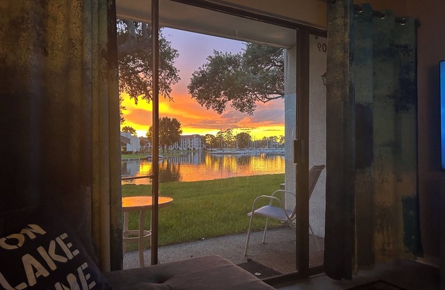 Waterfront Condo with the Lake Steps from Your Patio!