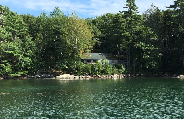 Waterfront Cottage with Sunsets, Hot Tub and Dock access