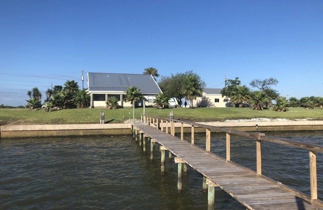 Waterfront Getaway! Relax in this waterfront home with pier on huge lot!