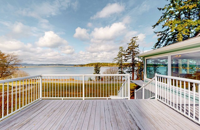 Waterfront home on Fisherman Bay with amazing deck, sunset view, & Ping-Pong