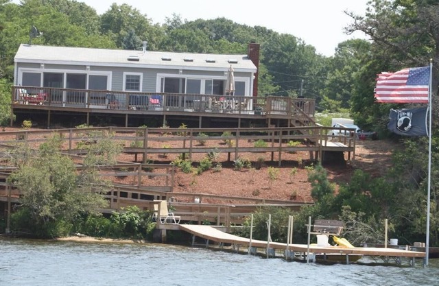 Waterfront on John's Pond with 70 foot Private Dock