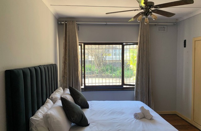 Welcome to Palm Haven on Sarnia, your urban retreat in the heart of Bellair.