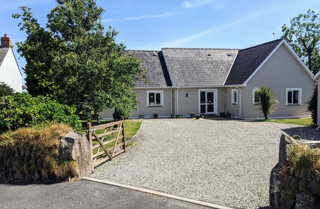 Well presented 3 bedroomed dormer bungalow with parking, garden and view