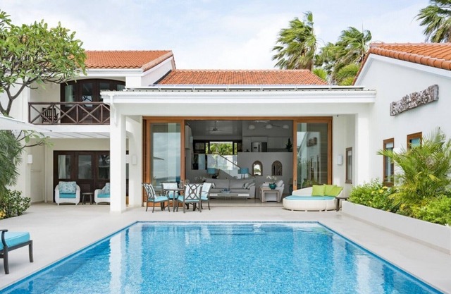 Whispering Palms | Beach Front | 4 Bedrooms