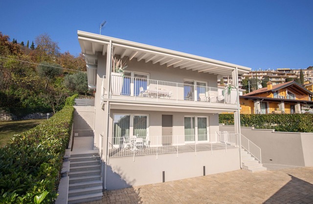 White Apartment with Terrace and Lake View