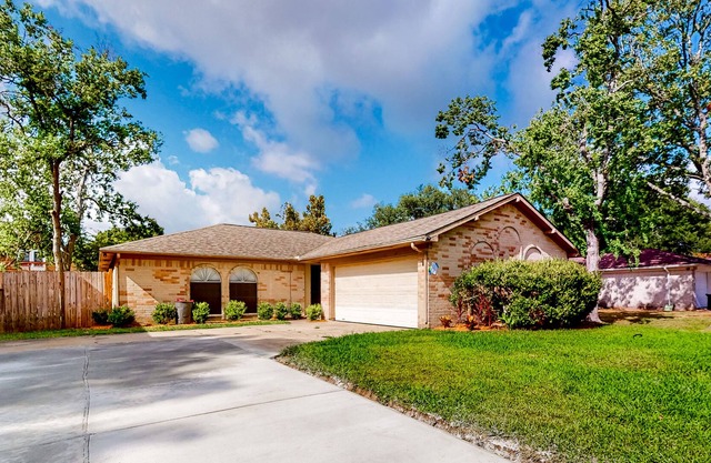 Windward Wonders | House in League City with an enclosed yard