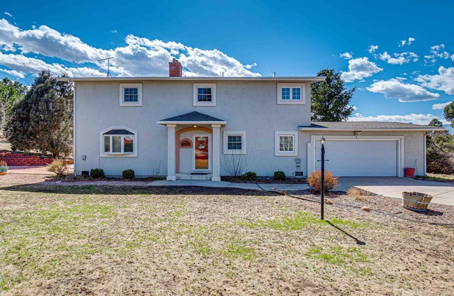 Wonderful 4 bedroom home in a rural neighborhood, but close to everything!