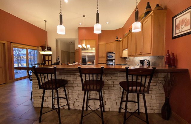 Wonderful home on tree covered 2 acre estate