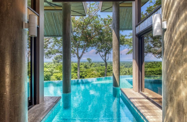 Wonderful home surrounded by nature with ocean views, private pool, and deck