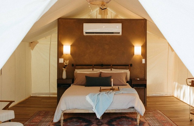 Wooded retreat space with glamping tents, container homes & tons of amenities!