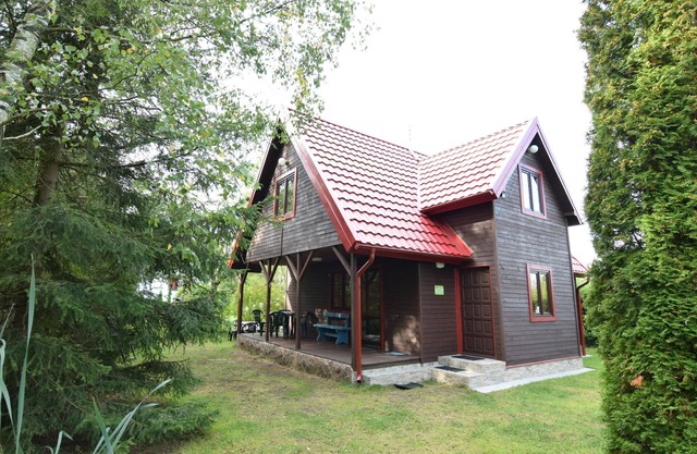 Wooden House by Lake Radunskie, Poland