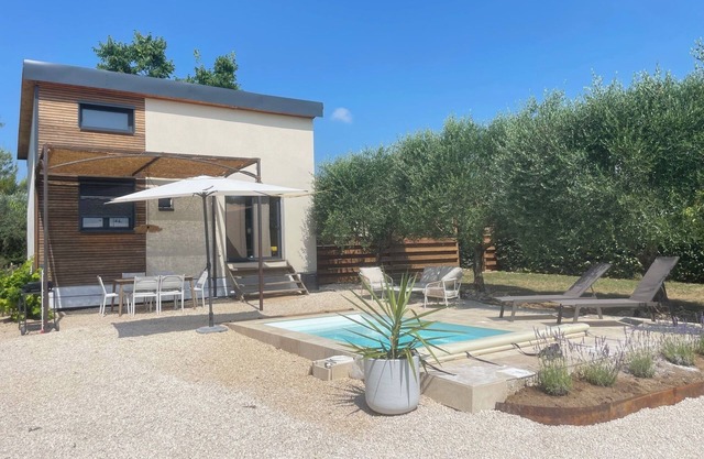 Wooden house in the countryside 5min from Anduze with private heated pool