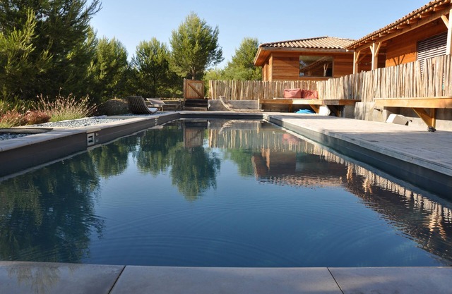 Wooden Houses Near Aix-en-Provence garden pool welcoming 12 to 16 people