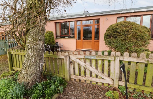 WOODPECKER, pet friendly, with open fire in High Head Castle Farm