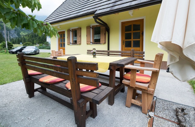 Yellow house in Trenta, next to Soča river