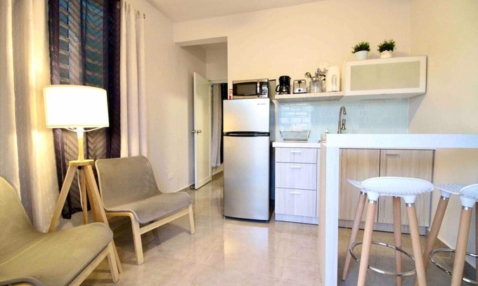 Mayaguez Pueblo Apartment | 1.3 Cozy Scandinavian Apt with Generator