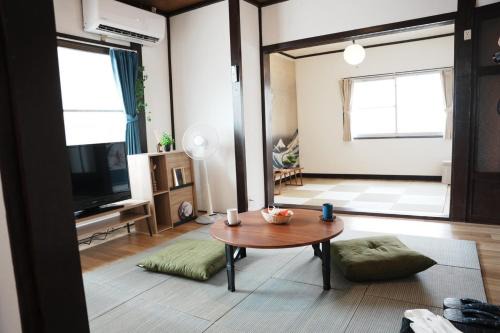 Shimobuchi House | 10人宿泊可 添い寝無料 1日1組限定で開放感のある90平米 吉野山40分 奈良大阪1時間 駅から徒歩5分 家主居住型 大淀桜庵