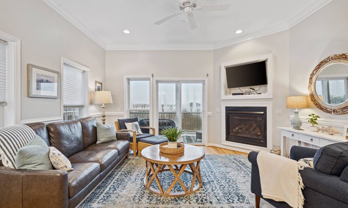 Waters Edge House | 110 Waters Edge! Luxury River Views with Community Pool, Screen Porch