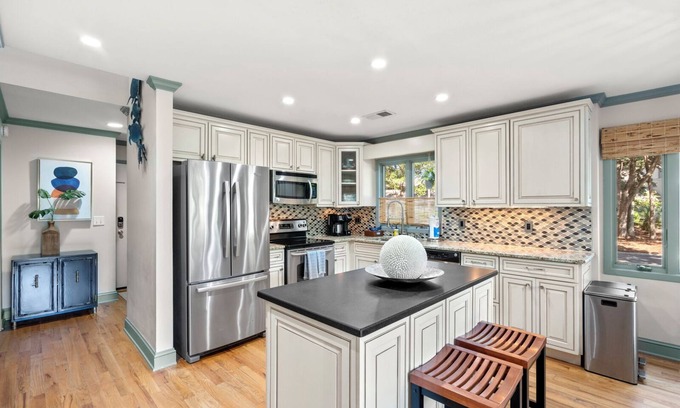 West Beach Village Condo | 1337 Fairway Oaks: 3BR Villa, Lagoon Views, Near Beach, Beach Gear/Bike Credit