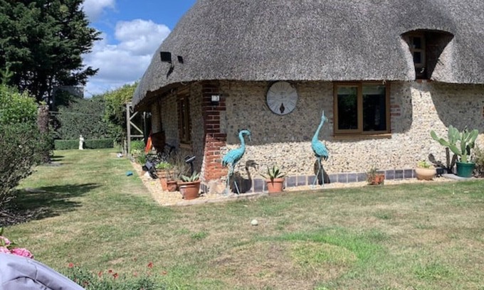 Ford Cottage | 18 Century Thatched Cottage tucked away secluded garden near Goodwood Racecourse