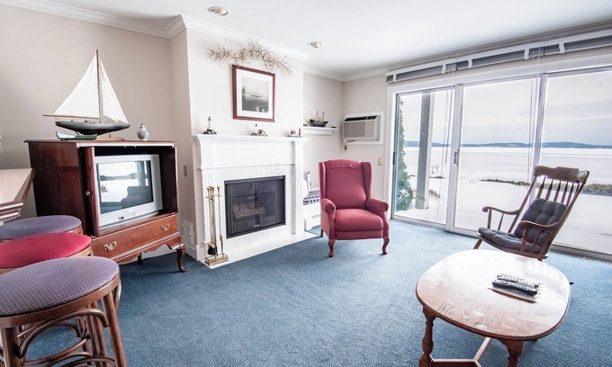 Boyne City Condo | 1BR Beachfront Condo on Gorgeous Lake Charlevoix | Fireplace | Sandy Beach |