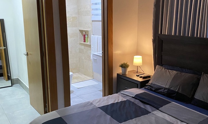 Ensanche Quisqueya Condo | 1Br- LUX Location, Pool, Sauna, GYM -no need car for accommodation-