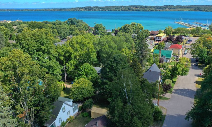 Suttons Bay House | 2/2 CUTE, ANTIQUE FILLED HOME DOWNTOWN SUTTONS BAY!