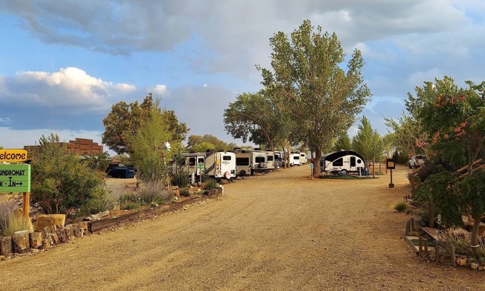 Escalante House | (2) 60' Back-ins or (1) Extended RV Site Pull Through (up to 45'), Full Hookup (30/50 amp), Fire Rings and Picnic Tables