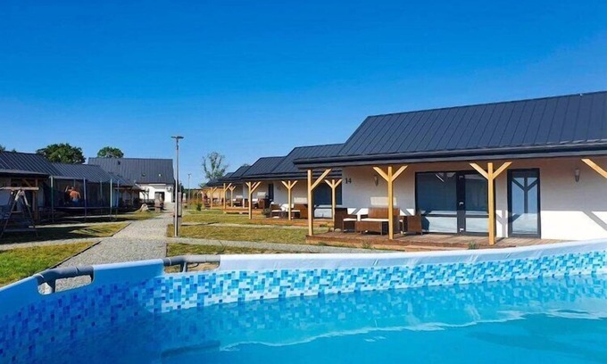 Postomino House | 2-Bed Holiday Homes with Pool