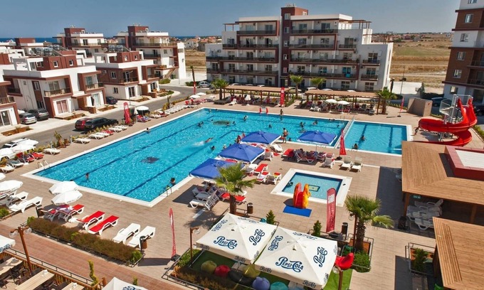 Trikomo Apartment | 2 BEDROOM FLAT WITH POOL AND RESTAURANT VIEW, 15 MIN WALK TO SANDY LONG BEACH