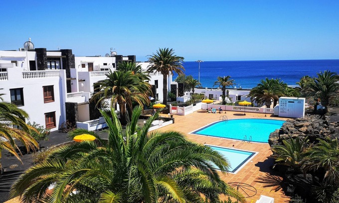 Puerto del Carmen Apartment | 2 Bedroom Homely Apartment With Wonderful Sea Views From The Living Room & Wi-Fi
