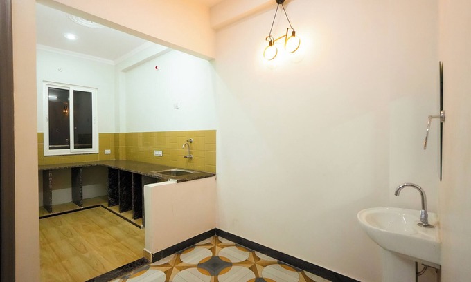Sigra House | 2 bedroom set with 5 seater sofa in living room, WIFI, AC in Varanasi city.