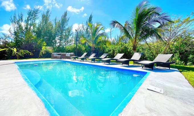 Treasure Cay House | 2 master suites w/2 separate living spaces w/pool & private beach access
