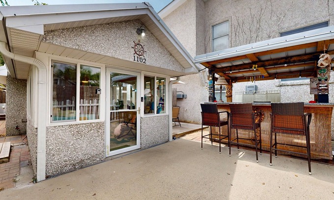 Saint Simons Island Cottage | 2 Minute Walk to Beach, Pet Friendly, Hot Tub, Convenient Private Parking