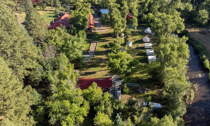 Canoncito RV Rental | 2 Person Glamping tent with one Queen Bed @ Field Trip NM .