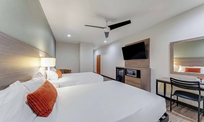 Eastside Promise Neighborhood Hotel | 2 Spacious Room w/Complimentary Breakfast Ideal for Group Business Trip