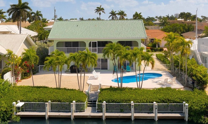 Coury House | 2 story home w/7 bedrooms,4 baths, private pool, 60ft of dockage, ample parking