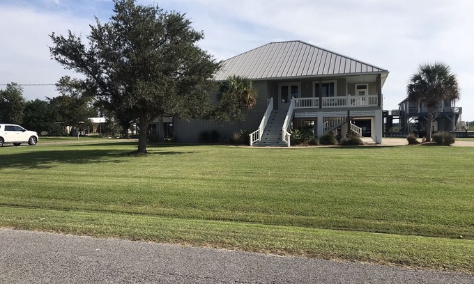 Hackberry House | 200 feet on the water with boat house!