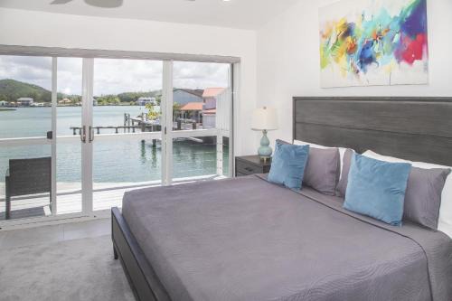 Jolly Harbour House | 232E South Finger, Waterfront Villa, Jolly Harbour