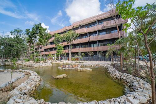 Playa Paraiso Apartment | 2BR Jungle View Condo - Free Beach Club