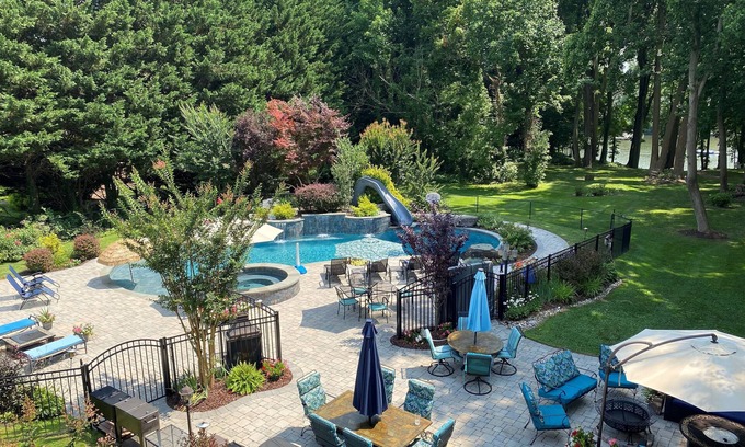 Herald Harbor House | 3 acre waterfront estate - heated pool, hot tub, yard, pier, game and pub room!