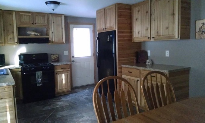Grayling House | 3 BD, 2 BA Cabin on Big Creek in Lovells, MI
