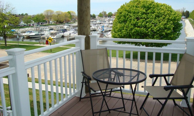 Ludington Condo | 3 Bed, 2 Bath Condo with Large Balcony offering Amazing Marina & Harbor Views