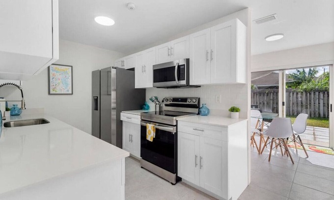 Princeton House | 3 Bedroom 2 Bathroom with a BRAND NEW POOL W/ a huge backyard & BBQ next to Keys