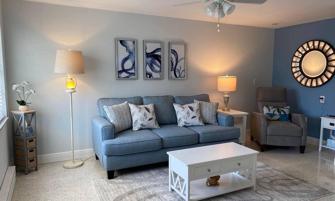 Holmes Beach Apartment | 3 Minute walk to beautiful AMI beach! Old Florida Charm with a Modern Flair!